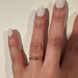 Brand new never been worn 14k rose gold wedding band.